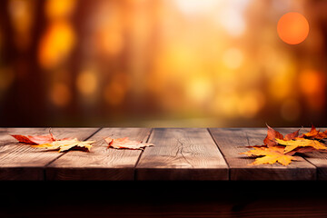 Wall Mural - The empty wooden table top with blur background of autumn.