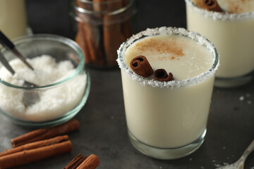 Wall Mural - Two glasses with traditional Puerto Rico cocktail Coquito