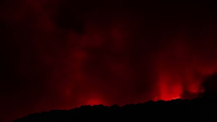 Wall Mural - forest fire burning at night, Time lapse on a mountain, nighttime, spain.