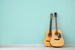 © Pixel-Shot - Two guitars near color wall