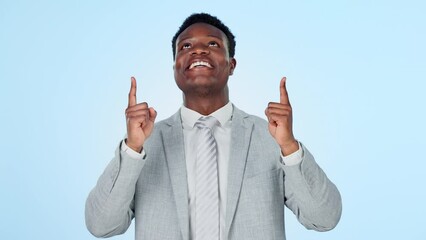 Canvas Print - Pointing up, face or happy businessman in studio on blue background for mockup space promotion. Black man, contact or African financial advisor showing a deal offer, announcement or investment news