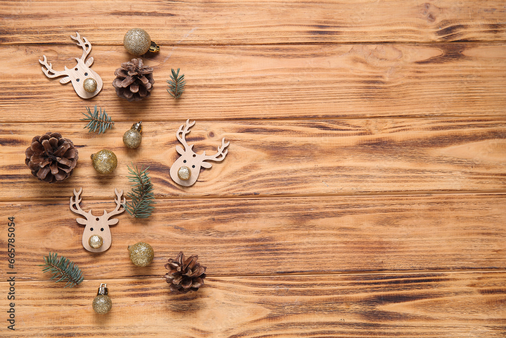 Composition with different Christmas decorations on wooden background