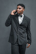 businessman talking on the phone, young latino black men dominican