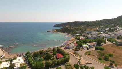 Wall Mural - Faliraki bay area and coastline in Rhodes greece on a beautiful day with waterfront resorts and the Mediterranean Sea