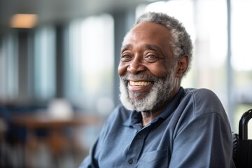 Wall Mural - Portrait of a happy senior man in a wheelchair at the nursing home