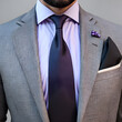 Gray suit and purple tie