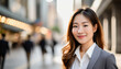© Kwangvann Ztudio - Successful Asian businesswoman standing in big city beautiful skyscraper road Think of a successful vision. Dreaming of new investment opportunities. Generative AI