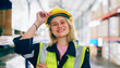 © Monster Ztudio - Young woman happy standing and looking at camera. Female warehouse worker smiley and smart confident at storehouse