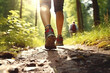 Sports shoe and legs on rock trail, hiker trekking or walking of footpath