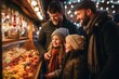 A rainbow family and their two daughters buy sweets at the traditional German Christmas market in the evening.