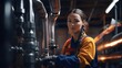 © LELISAT - Human plumber working near metal pipes indoor, female professional occupation