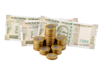 Wall Mural - 500 rupees note with coins pile isolated on white background with clipping path