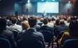 © Curioso.Photography - People in audience at the conference hall at business event.