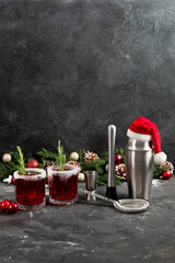 Wall Mural - Red christmas cocktail with cranberries in a glasses.