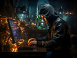 © Tomasz - Profile view of an individual in a hooded sweatshirt and Guy Fawkes mask working on a laptop.