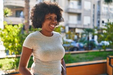 Poster - African american woman smiling confident looking to the side at park