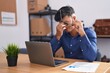 © Krakenimages.com - Young hispanic man business worker stressed using laptop at office