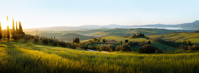 panorama of landscape with sunrise in tuscany, italy