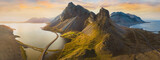 Fototapeta Natura - beautiful scenic road in Iceland, nature landscape aerial panorama, spectacular mountains and coast with sunset light