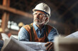 © vvalentine - Thoughtful mature architect at construction site, generative ai