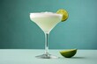  a margarita cocktail with a lime slice on the rim and a green background.  generative ai