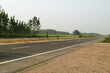 © picsmart - Clean and empty highway road at uttar pradesh