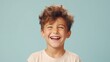 © Humam - Cute Laughing Boy isolated on the Minimalist Pastel Color Background
