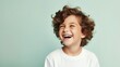 © Humam - Cute Laughing Boy isolated on the Minimalist Pastel Color Background