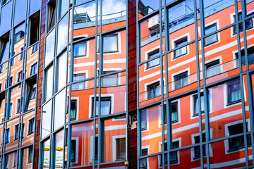 Canvas Print - typical reflection at a modern office building