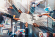 © alphaspirit - Businessmen working together to build a puzzle as teamwork, partnership and integration concept