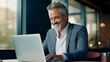 © PETR BABKIN - MANAGER TALKING TO BUSINESS PARTNERS USING LAPTOP, HORIZONTAL, IMAGE. image created by legal AI