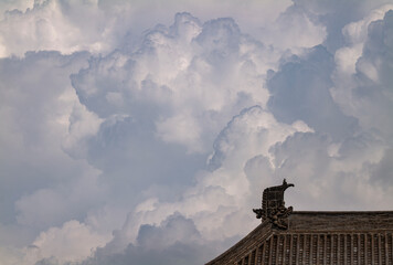 Rooftop of temple in Datong, China, against cloudy sky