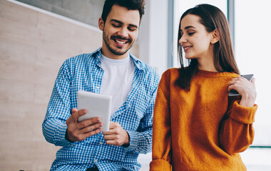 Wall Mural - happy smiling male and female bloggers enjoying chatting with followers