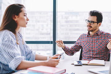 Wall Mural - intelligent professional employees talking during cooperation in office