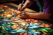Various stages of working with stained glass. Master's hands make stained glass, stained glass making, Heritage Craft