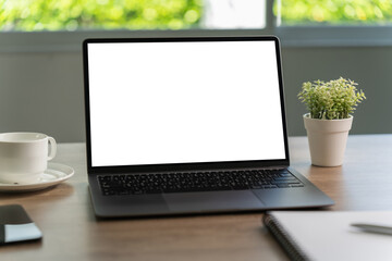 Wall Mural - laptop with blank screen on table. workspace background new project on laptop computer with blank co