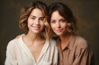 studio portrait of two young beautiful women.