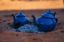View Of Tea Pots On The Sand In The Sahara Desert, Algeria, Africa.