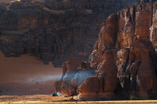 View Of Rocks With High Cliffs Mountains In The Sahara Desert At Sunset, Djanet, Algeria, Africa.