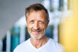 © Westend61 - Smiling mature man with beard