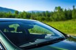 © altitudevisual - detail shot of freshly installed sedan windshield