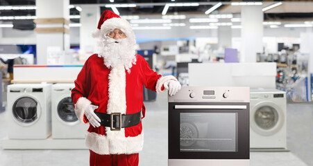 Sticker - Santa claus with an oven at appliances store