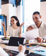 © BullRun - Joyful colleagues analysing documents and charts during meeting