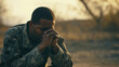 © kalafoto - An American soldier with ptsd sits sad