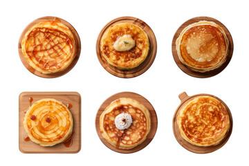 Wall Mural - Collection of top view tasty pancakes on wooden board isolated on transparent background, cut out