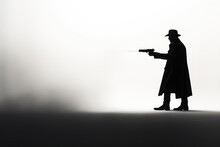Silhouette Of A Male Killer Or Policeman In A Hat With A Gun On A Light Background. Copy Space For Text