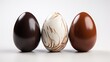  three chocolate eggs are lined up in the same row, one of them has a marbled egg shell.  generative ai
