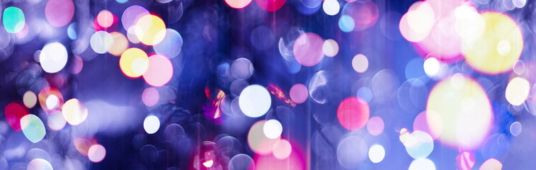 Wall Mural - Abstract light celebration background with defocused golden lights for Christmas, New Year, Holiday