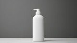 Fototapeta  - White empty cosmetic liquid dispenser bottle of soap, lotion, shampoo or shower gel mock up isolated in modern bathroom interior