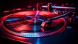 © Iarte - Turntable playing vinyl record in red and blue light